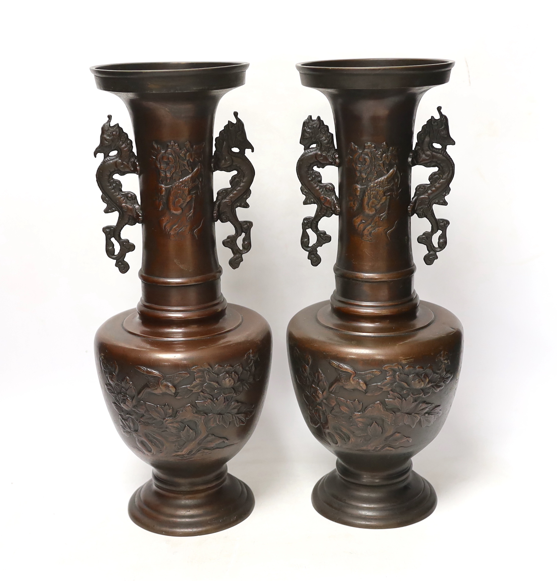 A pair of Japanese bronze vases, 38cm high